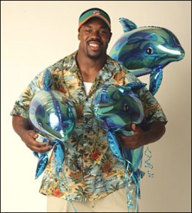 Former Miami Dolphin Joey Porter with Balloon Dolphins