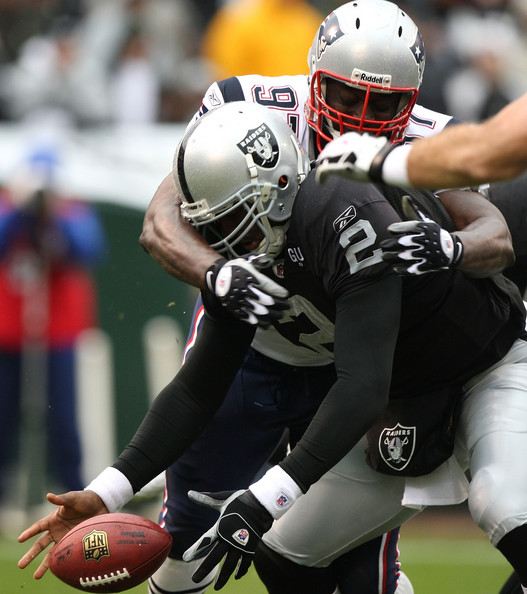 JaMarcus Russell fumbling the football.